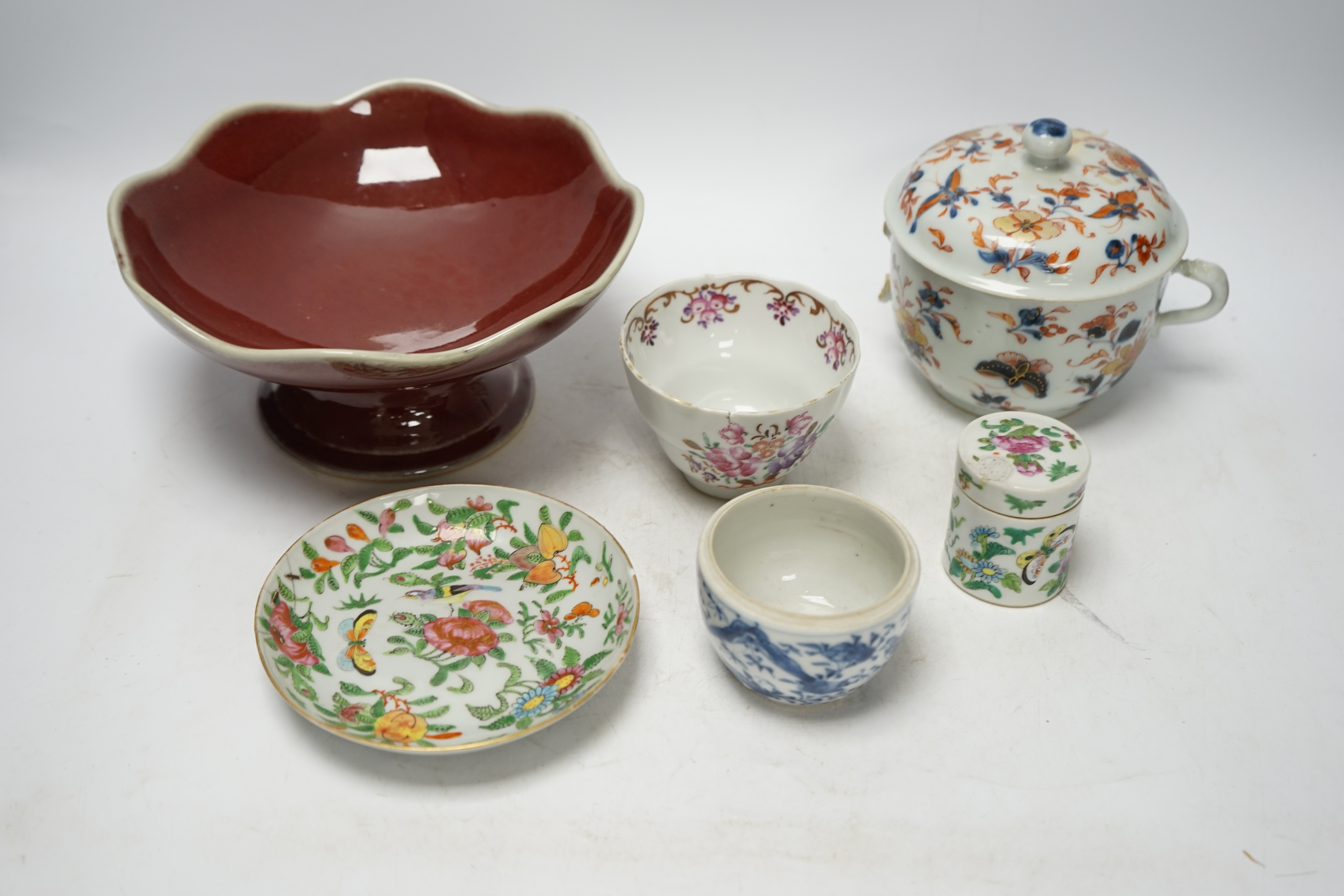 Chinese ceramics to include a sang de boeuf pedestal bowl and a famille rose dish, 20cm diameter. Condition - pedestal dish and one other good, others poor